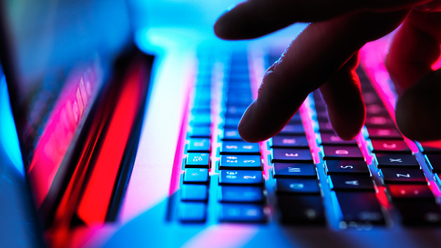 Student using artificial intelligence on laptop in classroom