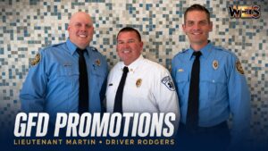 Lieutenant Tyson Martin and Driver Ryan Rodgers with Gadsden Fire Chief Vance Brown following their promotions