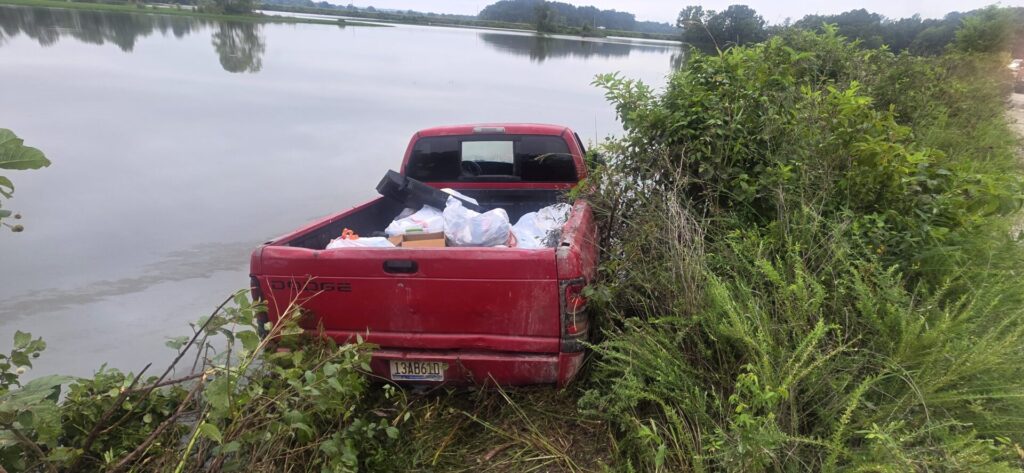 Pickup Found Partially Submerged Near Mud Creek