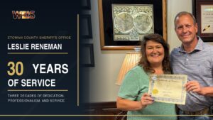 Leslie Reneman and Sheriff Jonathon Horton display her certificate recognizing 30 years of service to the Etowah County Sheriff’s Office.