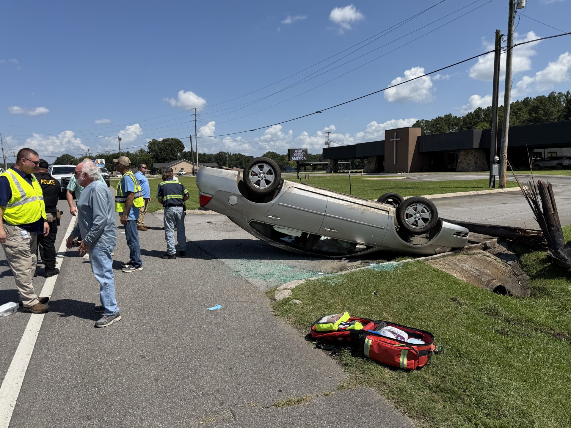 Emergency crews responding to a single vehicle accident on West Main Street in Centre.