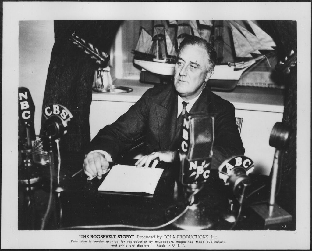 President Franklin D. Roosevelt speaking into several radio microphones