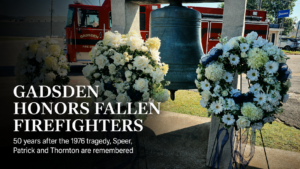 Memorial wreaths and fire bell at the Gadsden firefighter memorial marking 50 years since three firefighters were killed in the 1976 explosion