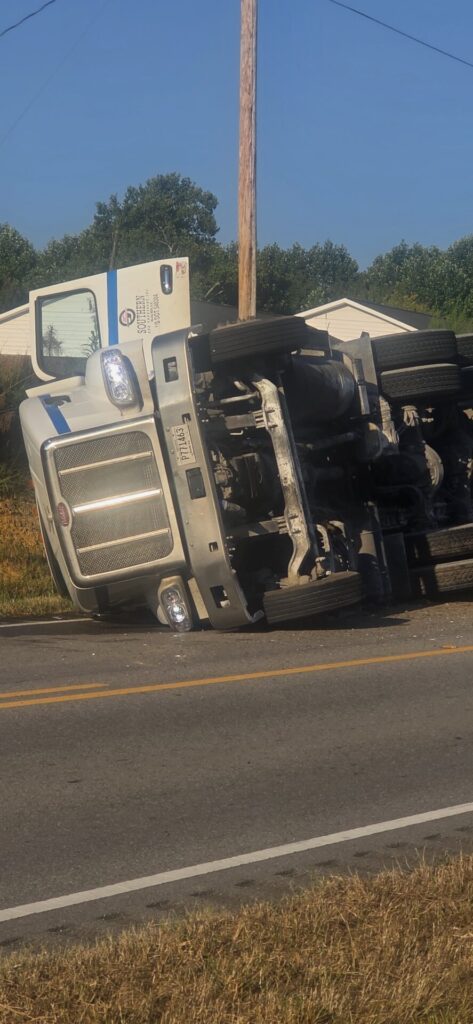 18-wheeler overturned on U.S. 411 in Moshat as recovery crews work at the scene