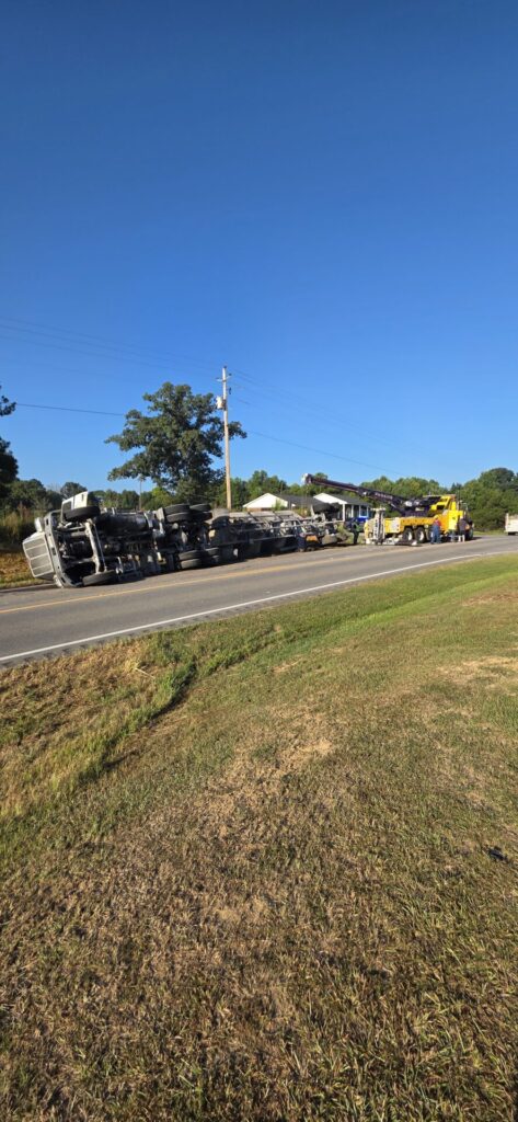 18-wheeler overturned on U.S. 411 in Moshat as recovery crews work at the scene