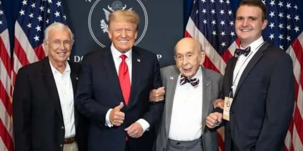 World War II Marine veteran Roy Drinkard pictured beside President Donald Trump.