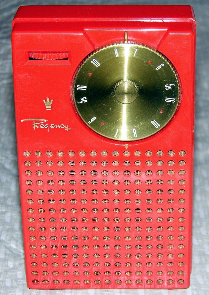 Mandarin-red Regency TR-1 portable transistor radio from 1954.