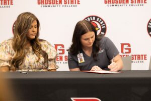 Gadsden State nursing apprenticeship signing ceremony recognizing six students hired by three area health care employers.