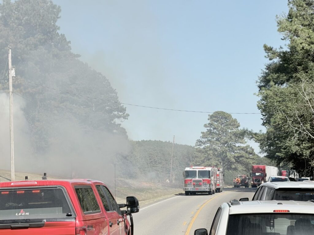 Firefighters respond to grass and brush fires along U.S. Highway 411 in Cherokee County.