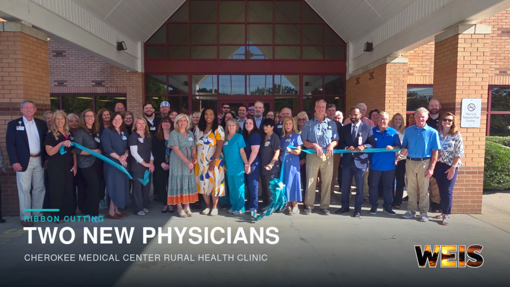 New family medicine physicians are welcomed by Atrium Health Floyd representatives and Cherokee County leaders during a rural clinic ribbon cutting.