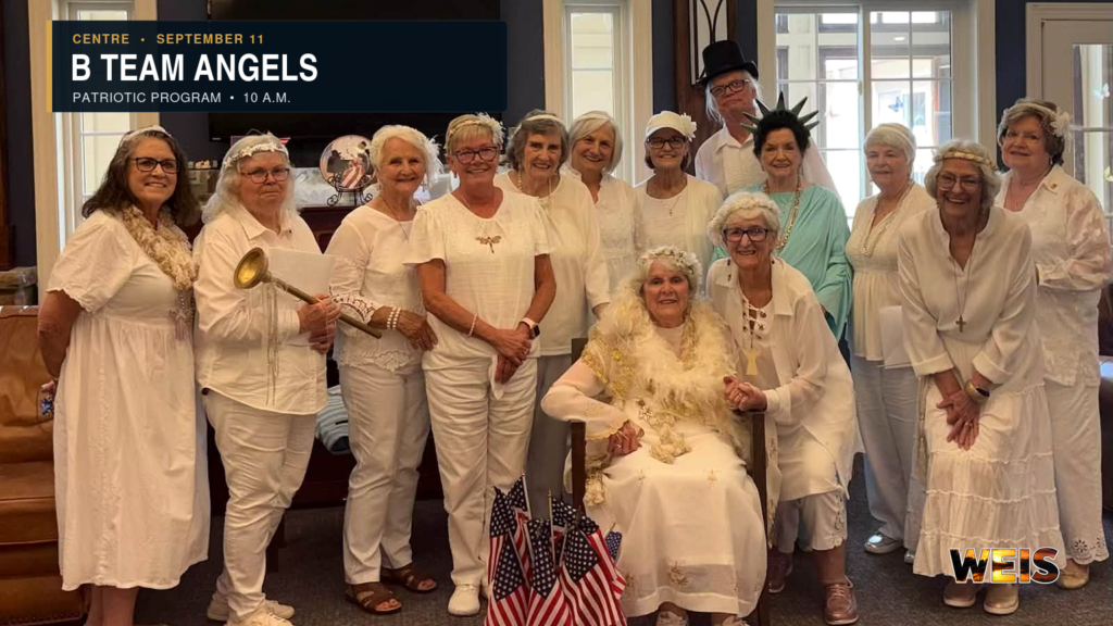 B Team Angels patriotic program news header showing the volunteer group gathered with American flags.