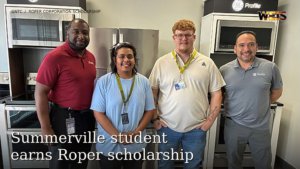 Roper Corporation Scholarship recipients Andres “Chuey” Hernandez and Michael Doane stand between Luther Ingram and Ben Canedo