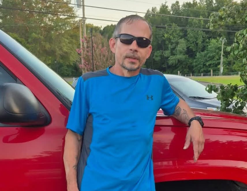 Missing-person alert for Quinton “Leroy” Bishop with his photograph, Albertville Police badge, and contact number 256-891-8222.