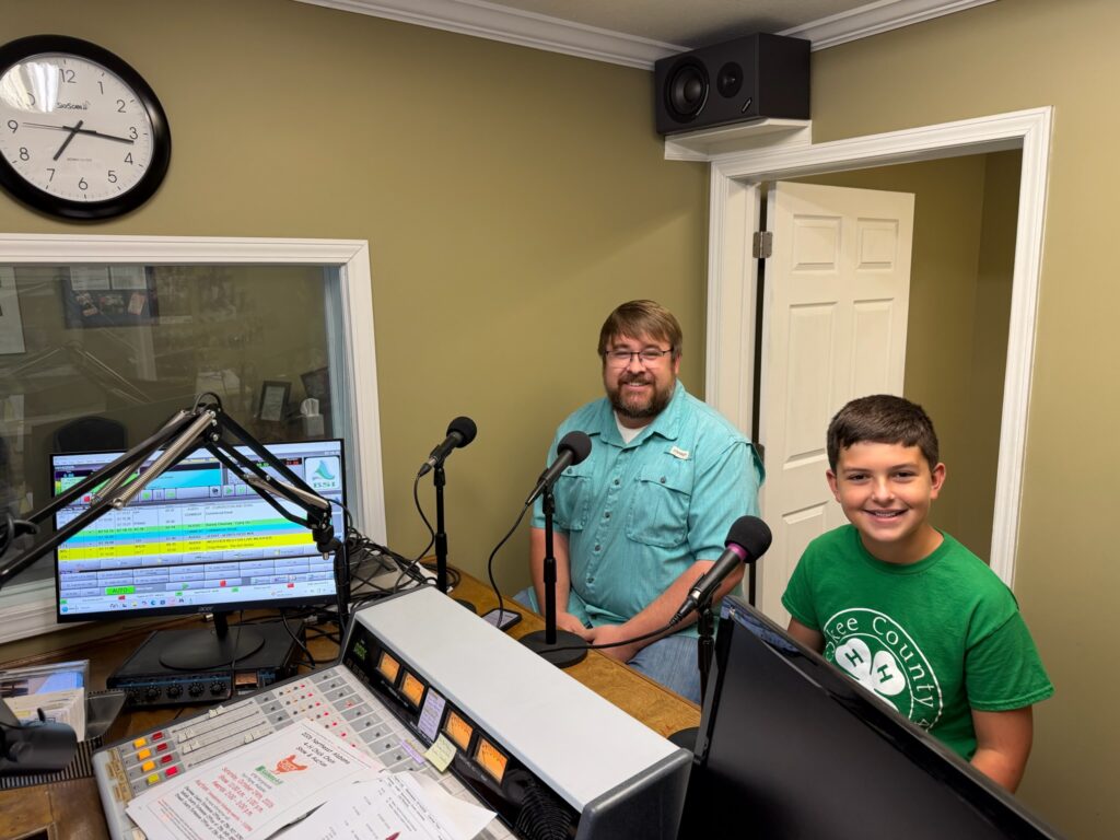 Porter Snead and Dr. Landon Marks at WEIS Radio for an interview about 4-H Chick Chain.