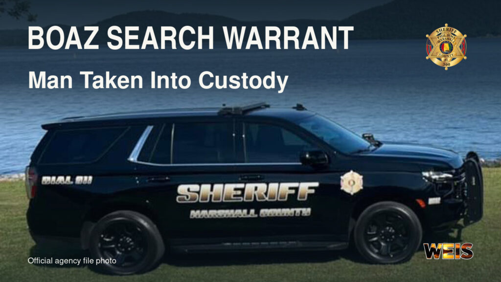 Official Marshall County sheriff’s SUV file photo with Boaz Search Warrant and Man Taken Into Custody headlines.
