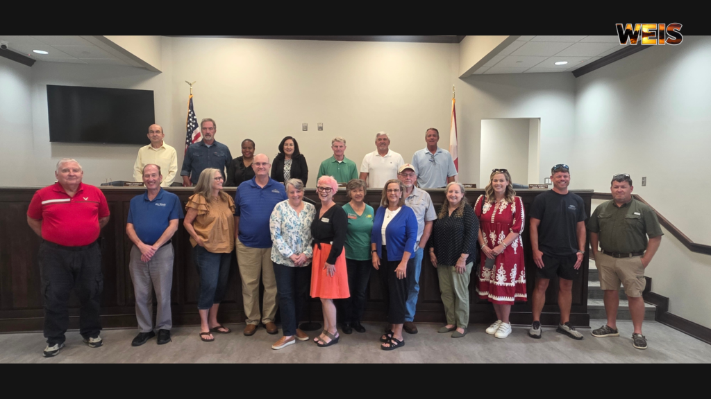Centre Main Street Alabama meeting participants gather at Centre City Hall after discussing downtown revitalization.