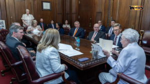 Kay Ivey and officials at a Public School and College Authority meeting on Alabama school funding.