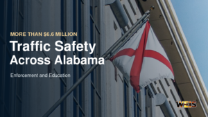 Alabama flag and building with traffic safety grants headline and WEIS branding.