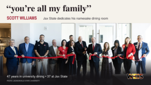 Ribbon-cutting group at the Scott Williams Dining Room dedication at Jax State, with a quote from Williams above the photograph.