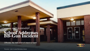 John S. Jones Elementary exterior in Rainbow City with headline about a BB gun brought to school.