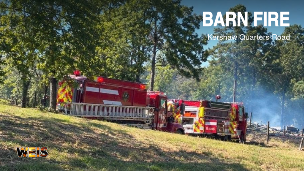 Fire engines and smoke at the Kershaw Quarters Road fire in Etowah County.