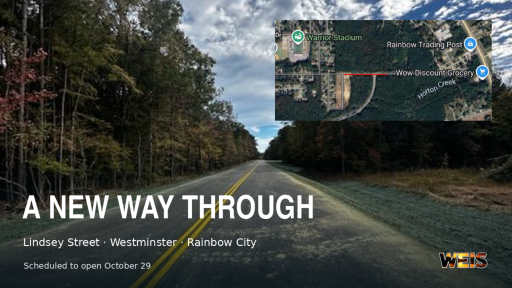 Rainbow City road connection header showing the paved Lindsey Street-to-Westminster route and an aerial map with a red route marker.